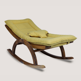 Yellow cushioned rocking chair